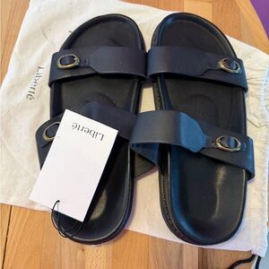 Liberté Black Sandals with Gold Buckles